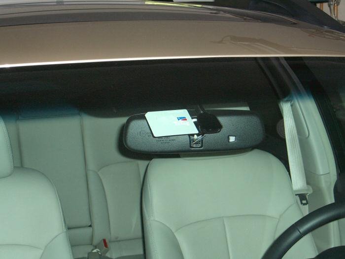 remove toll tags from front mirror